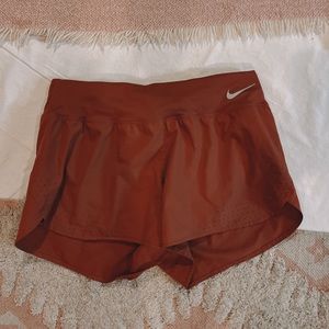 Nike run shorts in terracotta